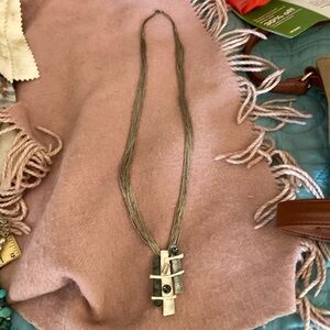 Sterling silver string necklace and a silver with multi beaded stone pendant